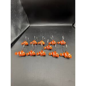 shower curtain hooks featuring clownfish, strongly resembling the character Nemo